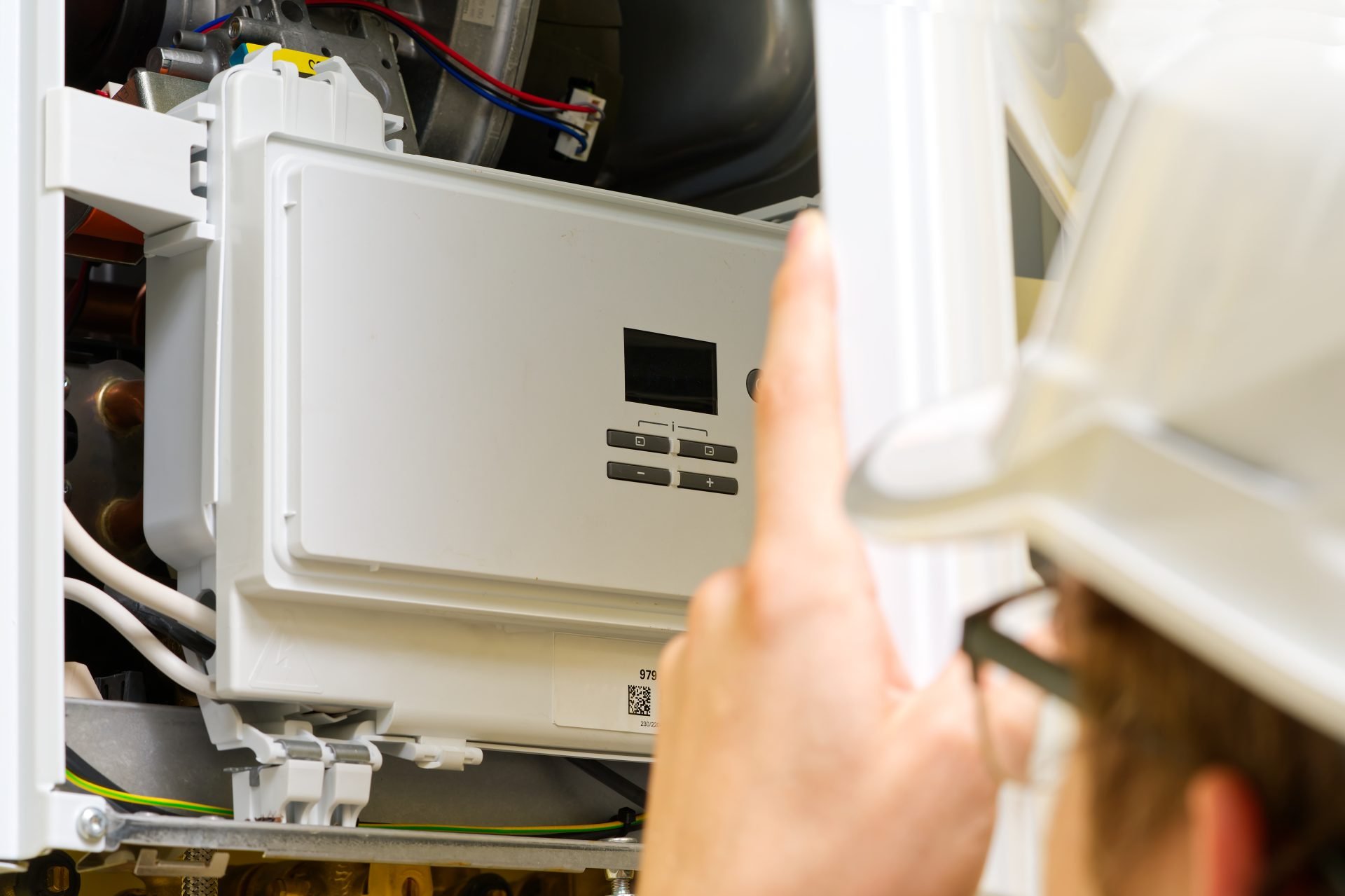 technician-servicing-or-repair-of-a-gas-boiler-se-2022-10-27-03-13-41-utc technician-servicing-or-repair-of-a-gas-boiler